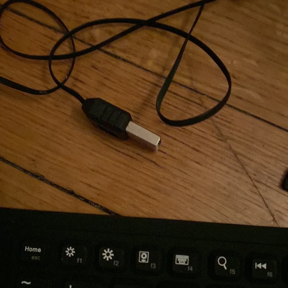Never used- Brookstone Bluetooth roll up keyboard!
